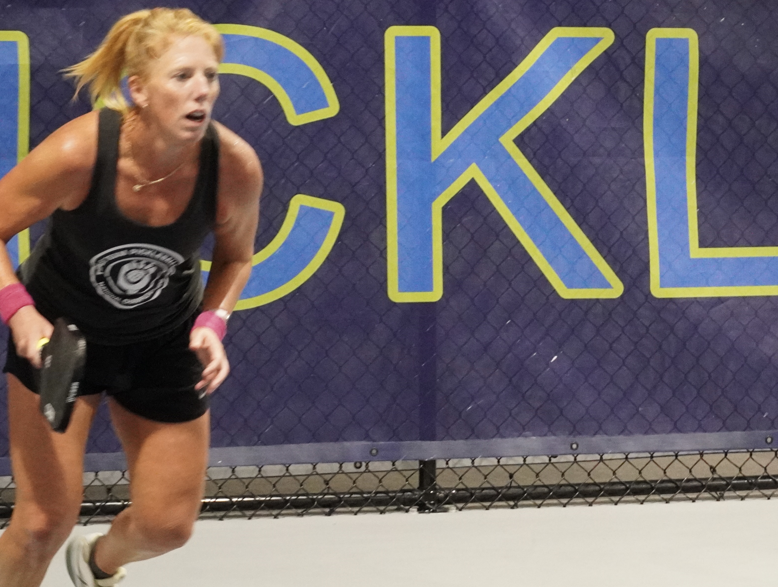 Amanda Sovik-Johnston focused in athletic stance during a pickleball match